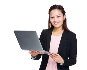 Asian businesswoman use notebook computer