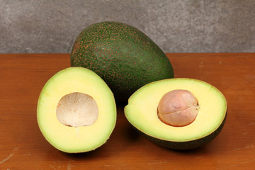 avocado cut  on the wood table