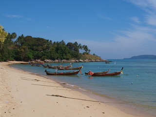 Fototapeta na wymiar longtail boats in bay of Phuket island, Thailand.