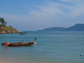 longtail boats in bay of Phuket island, Thailand.
