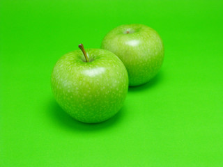 green apple on green background