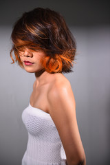 Obraz premium portrait of a beautiful girl with dyed hair coloring