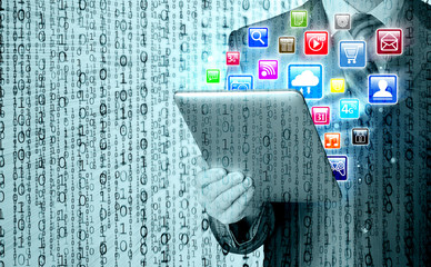 Business man use tablet pc with colorful application icons