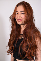 Fototapeta premium Beautiful model with long curly hair