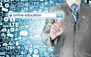Online education written in search bar on virtual screen.