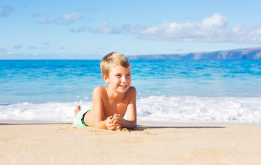 Fototapeta na wymiar Young Boy on the Beach