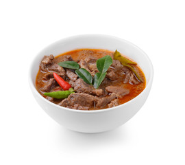 Panang curry with pork on white background