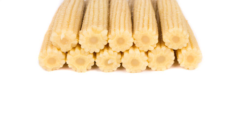 Close up of pickled small corn.