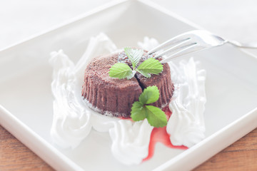 Chocolate lava on white plate