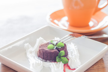 Chocolate lava with orange coffee cup