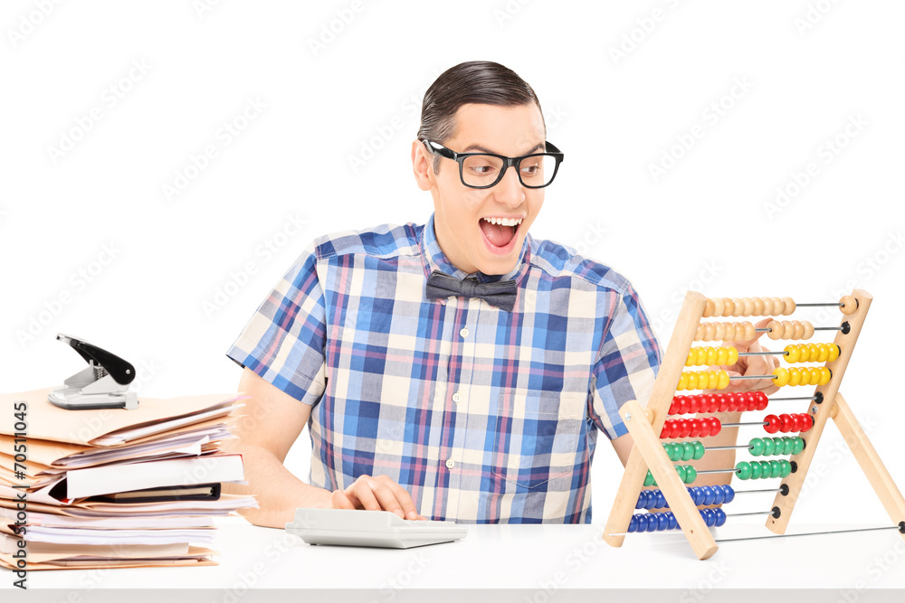 Sticker man calculating on an abacus seated at a table