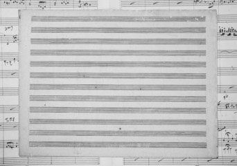 Blank Old Sheet Music on another sheet music, black and white