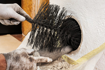 Cleaning the gas passes of a masonry heater