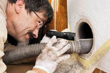 Cleaning the gas passes of a masonry heater