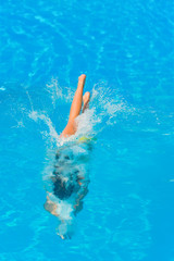 woman in bikini at the swimming pool