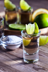 gold tequila with salt and lime