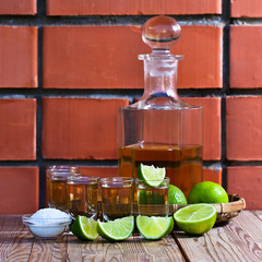 gold tequila with salt and lime