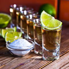 gold tequila with salt and lime