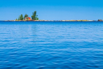 red cabin in the sea