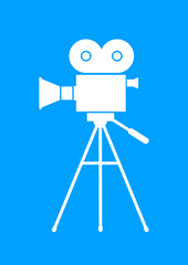 White movie camera on blue background