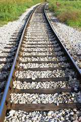 Fototapeta na wymiar Railroad track through the landscape