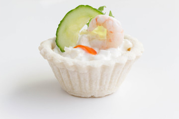 Salt tartlets with shrimps on white background