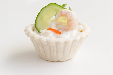 Salt tartlets with shrimps on white background