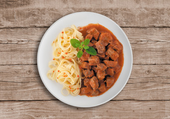 Goulash soup with spaghetti
