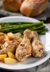 Roast chicken with potatoes and asparagus