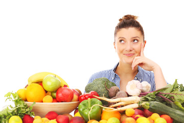 Happy woman with vegetables and fruits