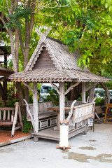 Wooden pavilion in the garden