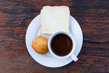 Cup of coffee and toast