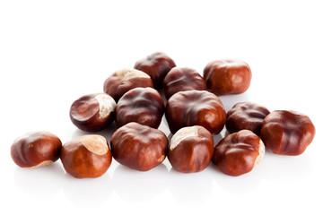 Chestnut on white background. ripe chestnuts