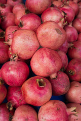 group of pomegranates.  pomegranate closeup, background