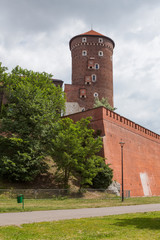 Tower and castle walls of red brick