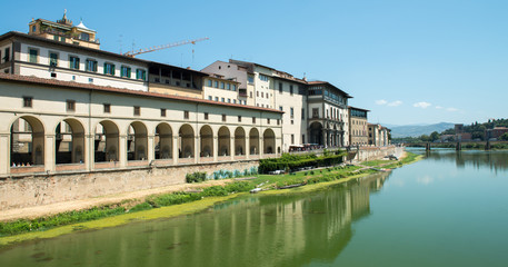Fototapeta na wymiar Florence, Tuscany. Beautiful view of Lungarni on a sunny day