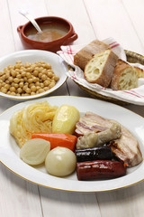 cocido madrileno, chickpea and pork stew, spanish cuisine
