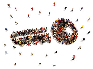Key to success. Large group of people in the shape of a key