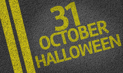 October 31 Halloween written on the road