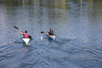 Two men in a canoes