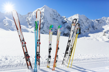Skiing , mountains and ski equipments on ski run