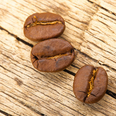 Coffee beans on old table - 1 to 1 ratio