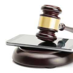 Smartphone under judge gavel - 1 to 1 ratio