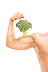 Naklejka na ściany i meble Muscular arm with a broccoli on the bicep
