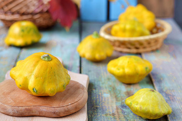 bush pumpkins on a background of wooden boards. selective focus