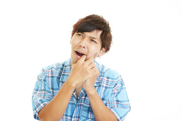 Fototapeta na wymiar 歯痛を訴える男性