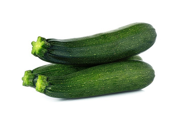 fresh green zucchini isolated on white background