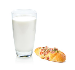 Glass of milk and  bread on white background