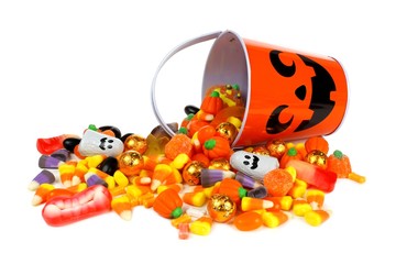 Halloween Jack o Lantern pail with spilling candy