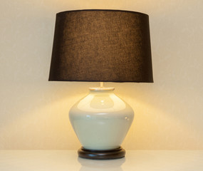 Shinning lamp on bedside table